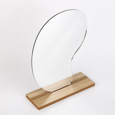Espejo de maquillaje iluminado portátil curvilíneo