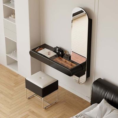 Dormitorio de la villa pequeño escritorio de maquillaje negro con cajones y luces LED